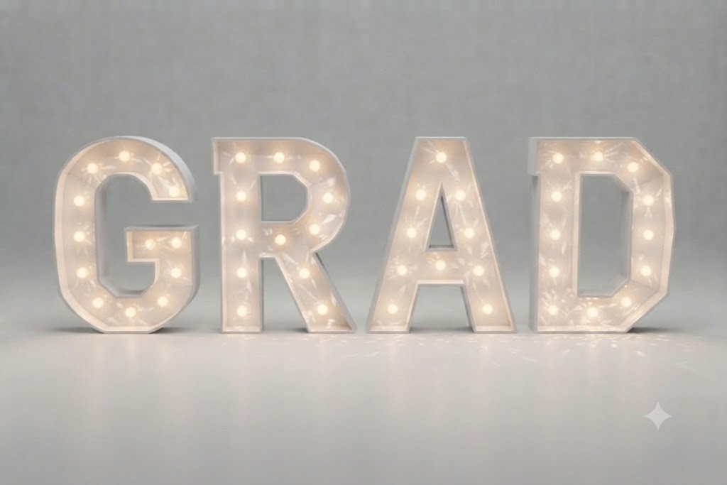 Wood marquee word GRAD, handmade with warm LED lighting for rent in Houston, TX and surrounding areas.
