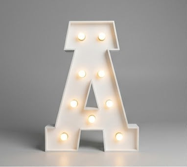 Wood marquee letter A, handmade with warm LED lighting for rent in Houston, TX and surrounding areas.