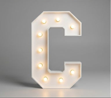 Wood marquee letter C, handmade with warm LED lighting for rent in Houston, TX and surrounding areas.