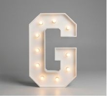 Wood marquee letter G, handmade with warm LED lighting for rent in Houston, TX and surrounding areas.