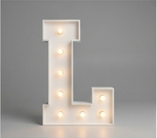Wood marquee letter L, handmade with warm LED lighting for rent in Houston, TX and surrounding areas.