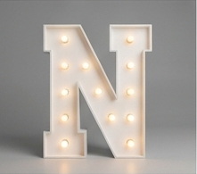 Wood marquee letter N, handmade with warm LED lighting for rent in Houston, TX and surrounding areas.