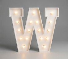 Wood marquee letter W, handmade with warm LED lighting for rent in Houston, TX and surrounding areas.