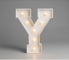 Wood marquee letter Y, handmade with warm LED lighting for rent in Houston, TX and surrounding areas.